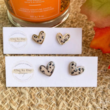 Load image into Gallery viewer, Metallic Rimmed Clay Heart Studs
